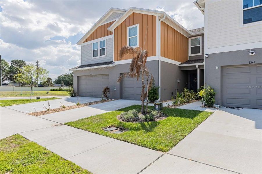 Front exterior of a new home in , Haines City, FL, highlighting curb appeal (Image 2). Front exterior of a new home in , Haines City, FL, highlighting curb appeal (Image 2).