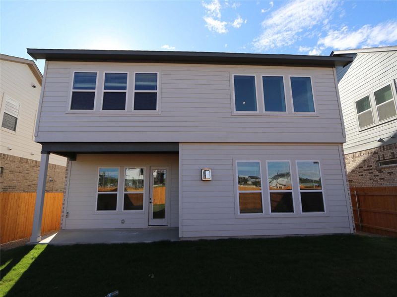 Exterior details and patio area of a home in Estancia West, Manchaca (Image 3).