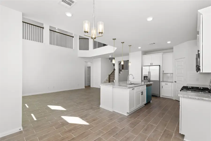 Furnished interior view inside a new home in Harmony Cove, Humble (Image 12).