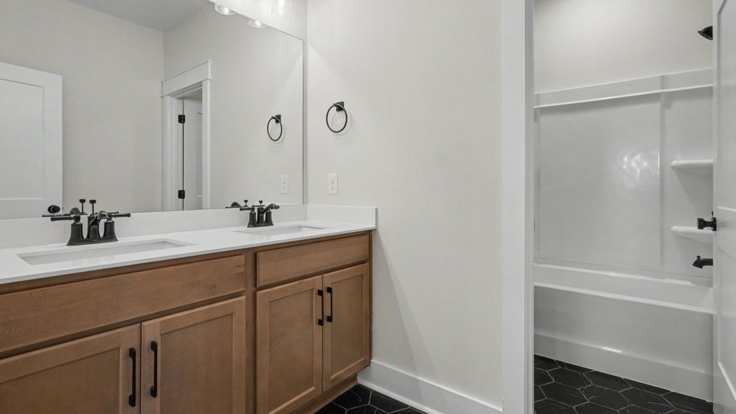 Secondary bathroom with dualvanity