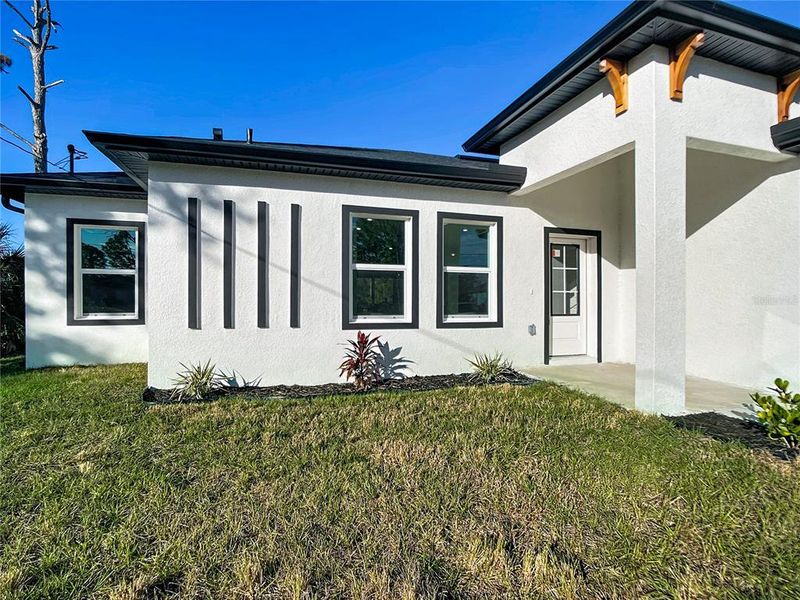 Exterior details and patio area of a home in , Lehigh Acres (Image 3).