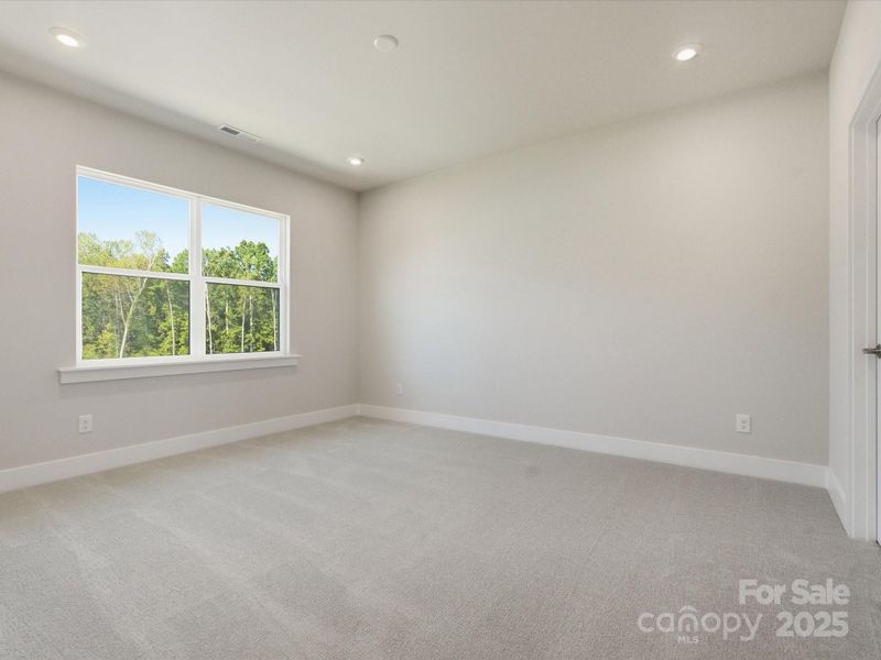 Bedroom 3 With Unobstructed Tree-Lined Views.