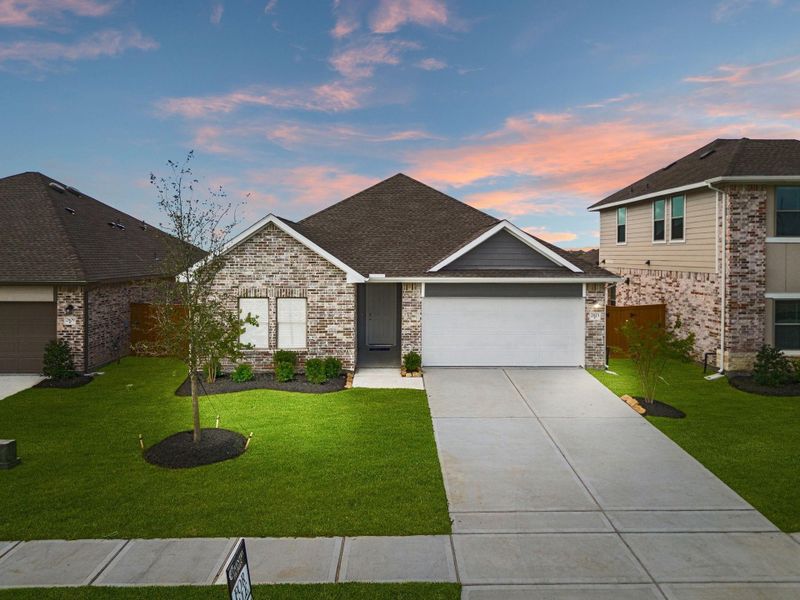 Front exterior of a new home in River Ranch Trails, Dayton, TX, highlighting curb appeal (Image 17). Front exterior of a new home in River Ranch Trails, Dayton, TX, highlighting curb appeal (Image 17).