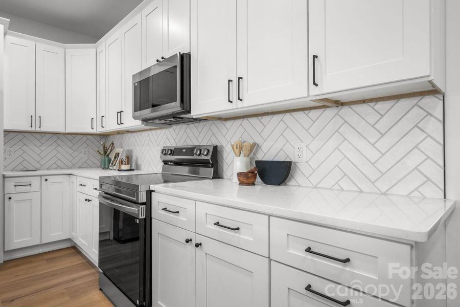 Furnished interior view inside a new home in , Hickory (Image 12).