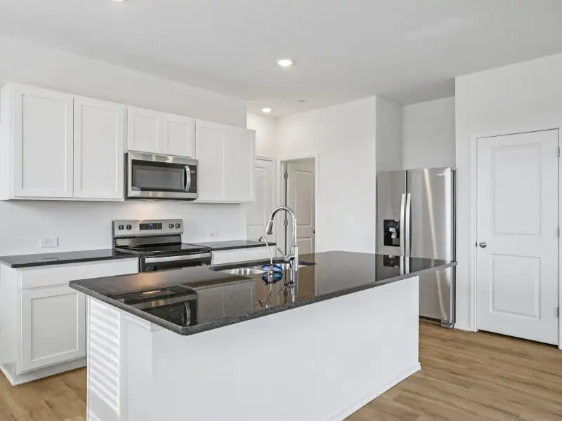 Furnished interior view inside a new home in Waterstone Village, Kyle (Image 3).