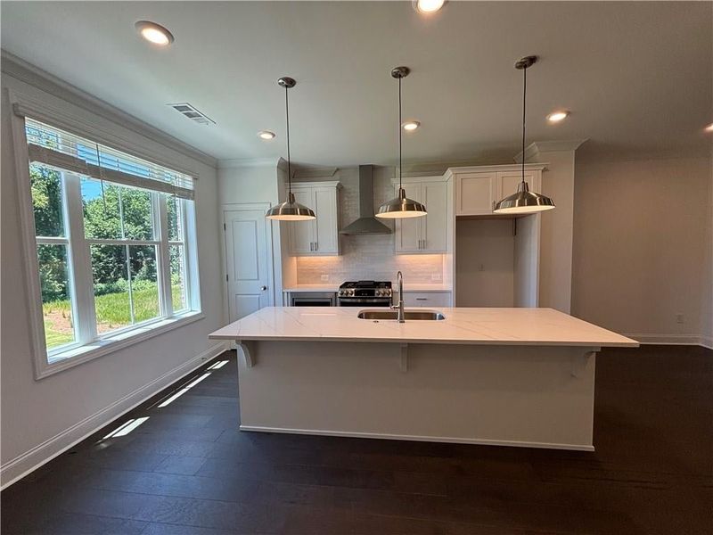 Put your barstools here and enjoy the kitchen!