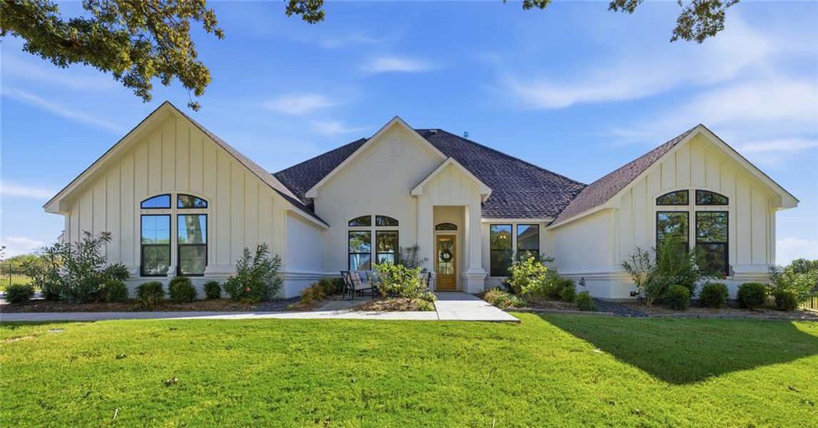 Front exterior of a new home in , Aledo, TX, highlighting curb appeal (Image 1).