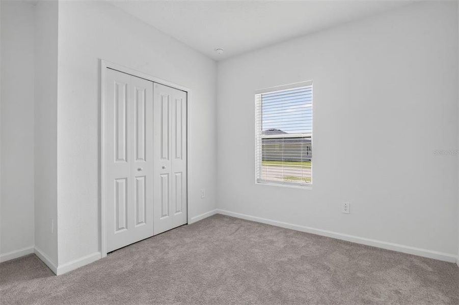 Spacious, unfurnished interior of a new home in Tara Forest East, Alachua (Image 42).