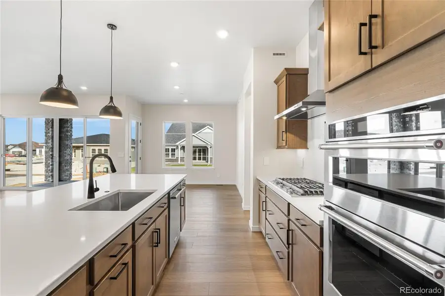 Furnished interior view inside a new home in Hilltop at Inspiration, Aurora (Image 11).
