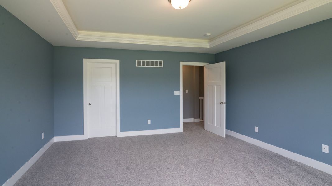 Representative unfurnished interior of a home built from the The Hartland by Norfolk Homes in Coronado Estates, Jackson (Image 56).