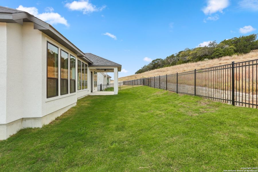 Exterior details and patio area of a home in Esperanza - 70', Boerne (Image 23).
