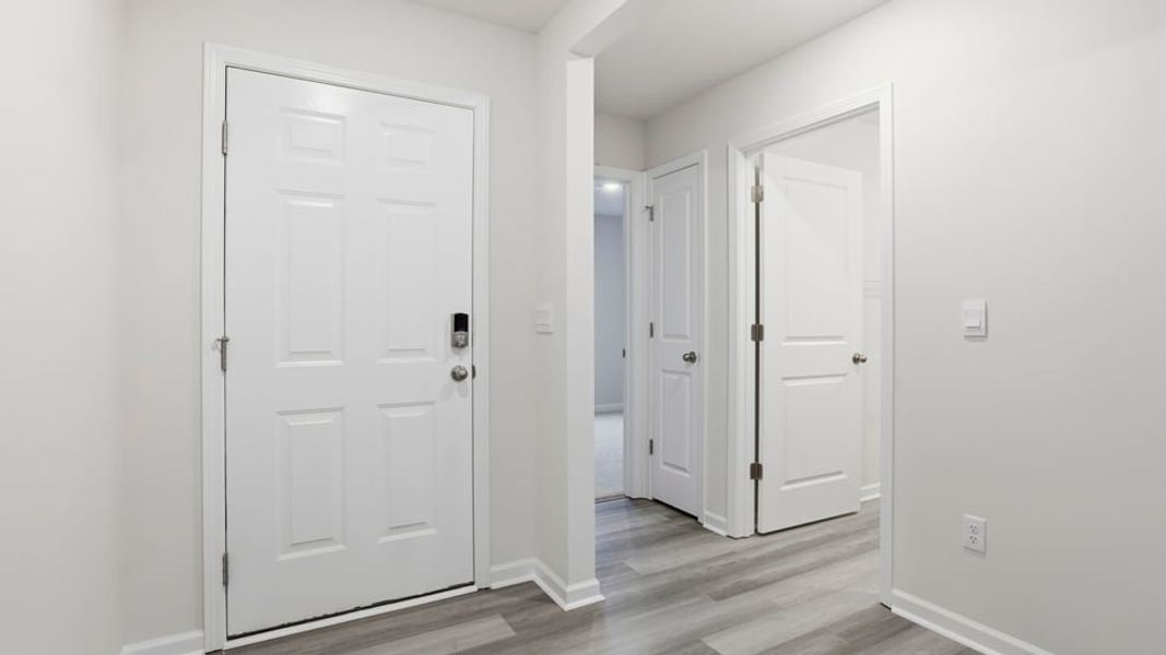 Spacious, unfurnished interior of a new home in Bentley Park, Greenwood (Image 12).