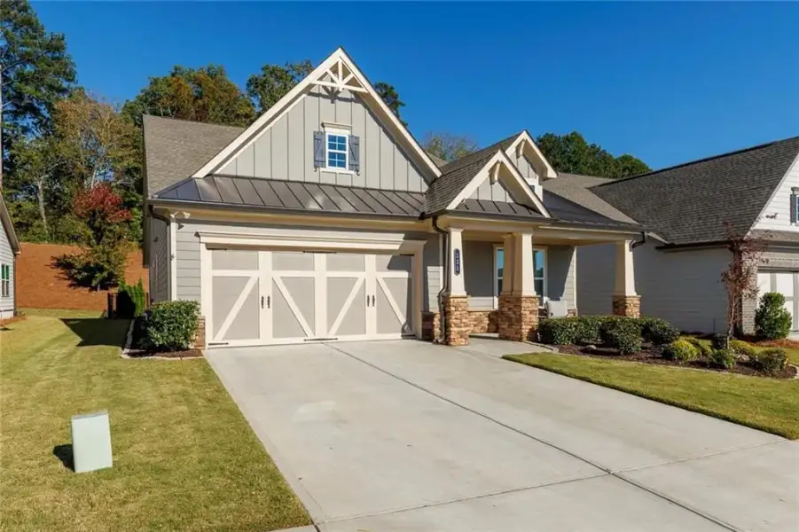 Front exterior of a new home in , Canton, GA, highlighting curb appeal (Image 2). Front exterior of a new home in , Canton, GA, highlighting curb appeal (Image 2).