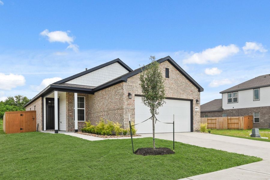 Front exterior of a new home in River Ranch Trails, Dayton, TX, highlighting curb appeal (Image 2). Front exterior of a new home in River Ranch Trails, Dayton, TX, highlighting curb appeal (Image 2).