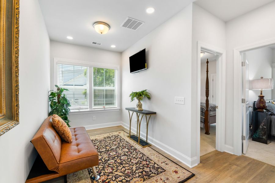 Furnished interior view inside a new home in Oak Bluff, Charleston (Image 19).