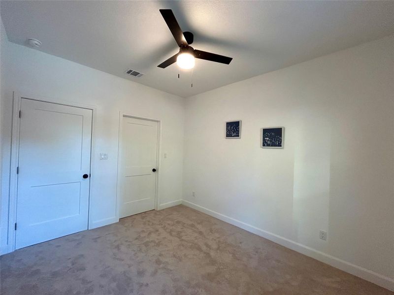 Third small bedroom with large walk-in closet.