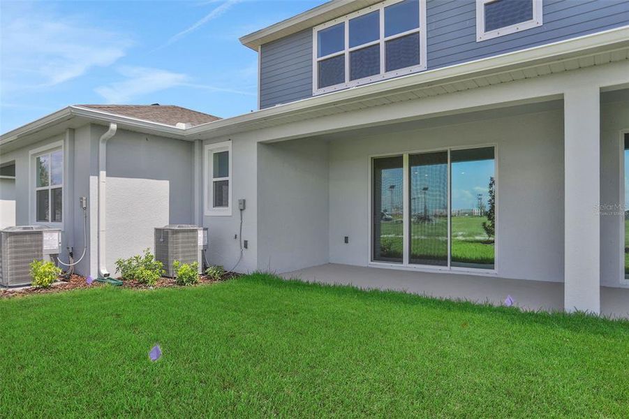 Exterior details and patio area of a home in Seaire, Parrish (Image 3).
