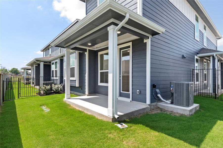 Back of property featuring a patio