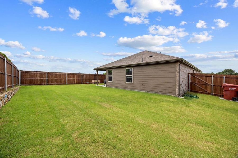 Exterior details and patio area of a home in Leonard Crossing, Leonard (Image 23).