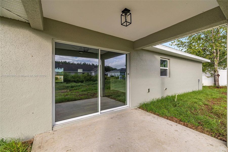 Exterior details and patio area of a home in , Ocala (Image 3).