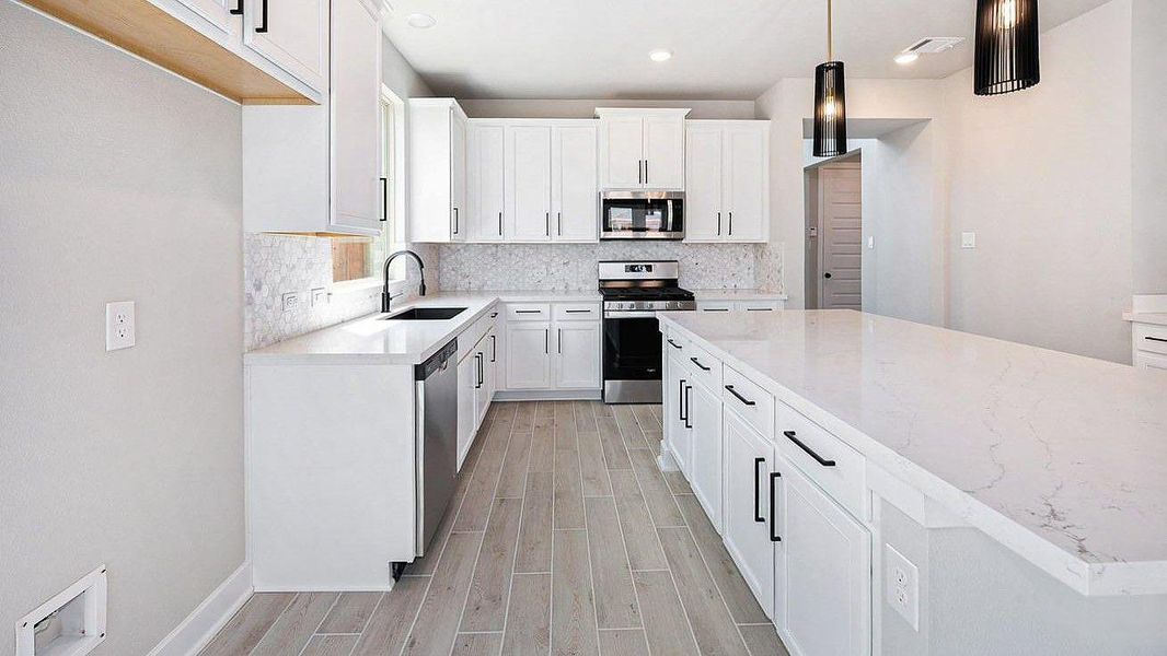Furnished interior view inside a new home in Grand Central Park, Conroe (Image 4).