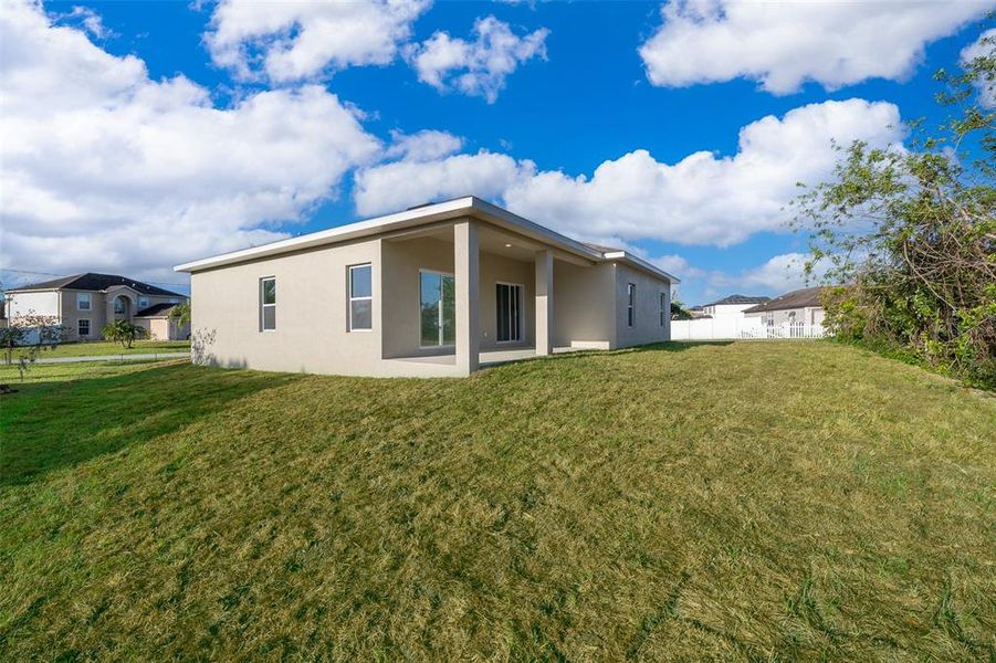 Front exterior of a new home in , Kissimmee, FL, highlighting curb appeal (Image 17). Front exterior of a new home in , Kissimmee, FL, highlighting curb appeal (Image 17).