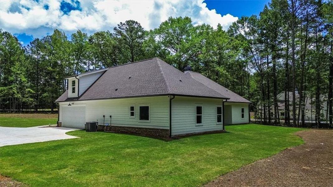 Front exterior of a new home in , Social Circle, GA, highlighting curb appeal (Image 25). Front exterior of a new home in , Social Circle, GA, highlighting curb appeal (Image 25).
