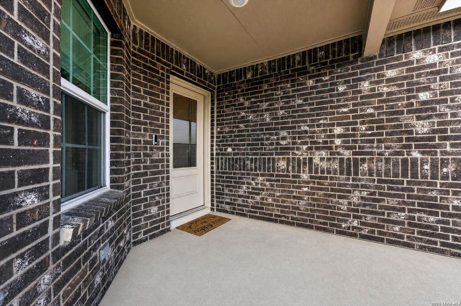 Exterior details and patio area of a home in Riverstone at Westpointe, San Antonio (Image 39).
