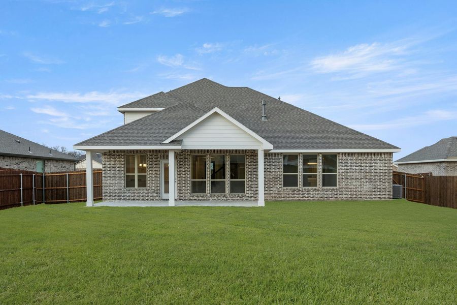 Exterior details and patio area of a home in Stone Eagle, Azle (Image 3).