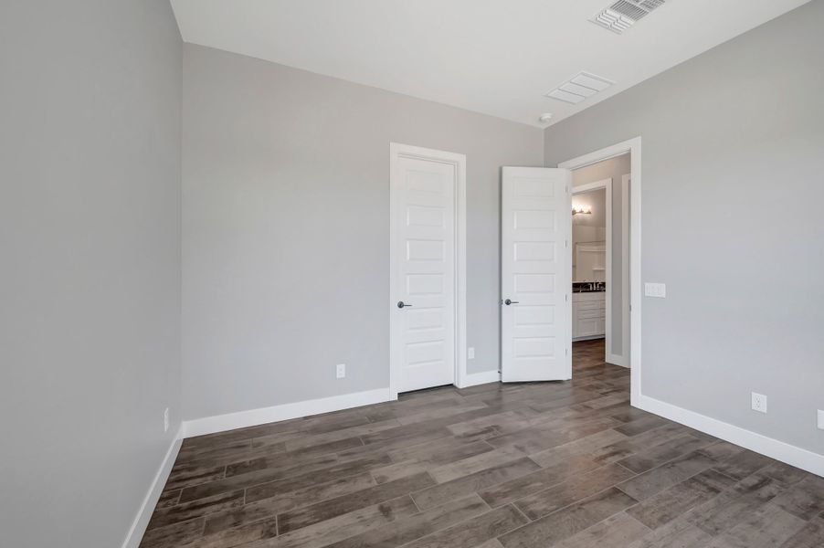 Spacious, unfurnished interior of a new home in Blossom Rock, Apache Junction (Image 36). Spacious, unfurnished interior of a new home in Blossom Rock, Apache Junction (Image 36).