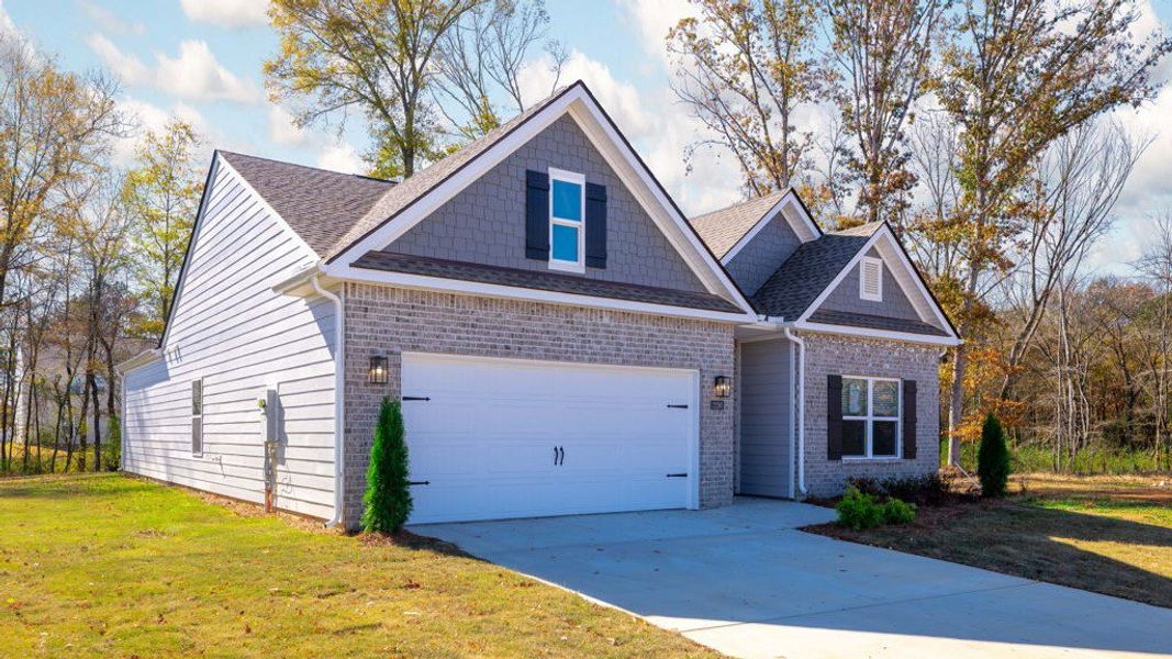 Front exterior of a new home in Fairview Hills, Cleveland, TN, highlighting curb appeal (Image 21). Front exterior of a new home in Fairview Hills, Cleveland, TN, highlighting curb appeal (Image 21).