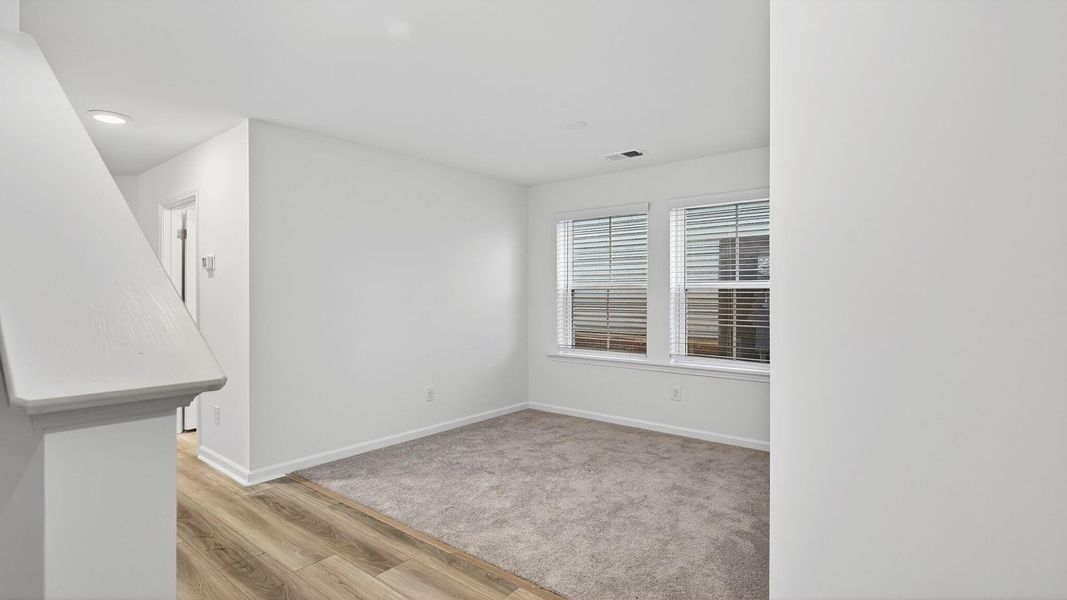 Spacious, unfurnished interior of a new home in Clear Springs Townhomes, North Charleston (Image 18).