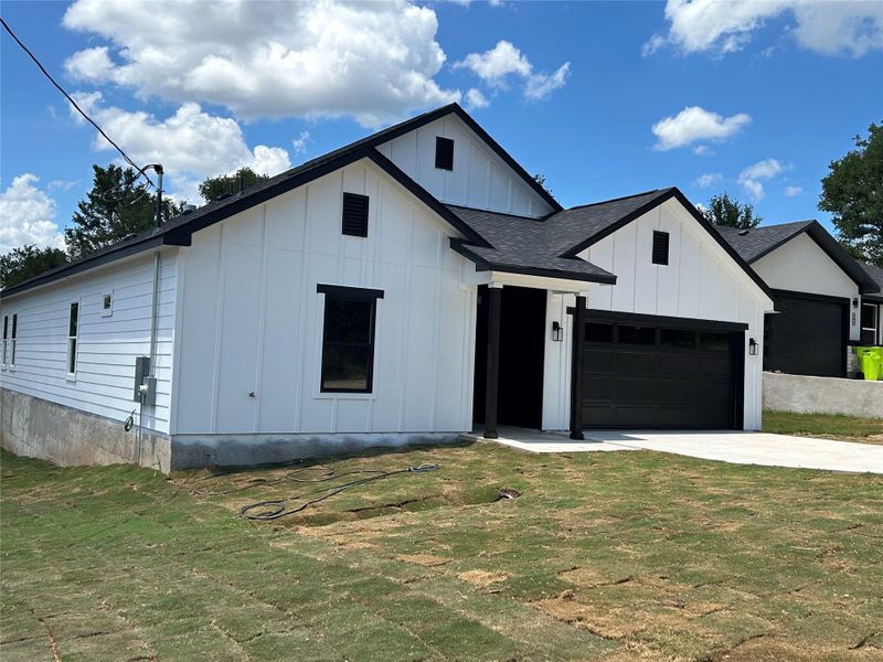 Front exterior of a new home in , Bastrop, TX, highlighting curb appeal (Image 2). Front exterior of a new home in , Bastrop, TX, highlighting curb appeal (Image 2).