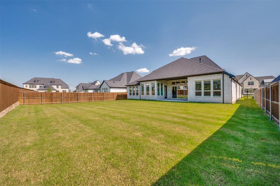 Exterior details and patio area of a home in , Prosper (Image 21).