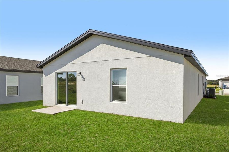 Exterior details and patio area of a home in Trilby Crossing, Brooksville (Image 2). Exterior details and patio area of a home in Trilby Crossing, Brooksville (Image 2).