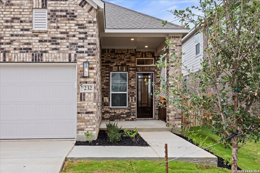 Exterior details and patio area of a home in Legacy at Lake Dunlap, New Braunfels (Image 4).