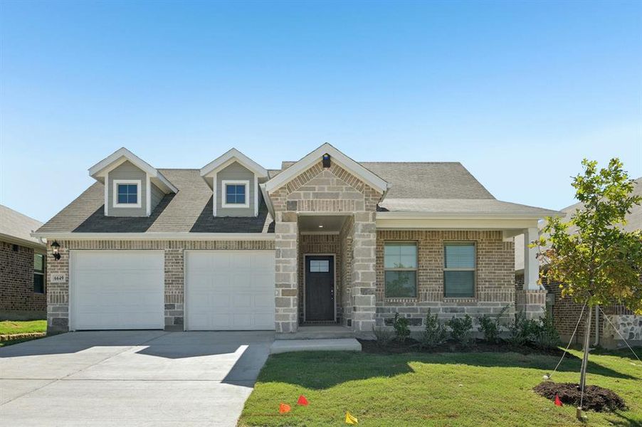 Front exterior of a new home in Tesoro at Chisholm Trail Ranch, Fort Worth, TX, highlighting curb appeal (Image 1).