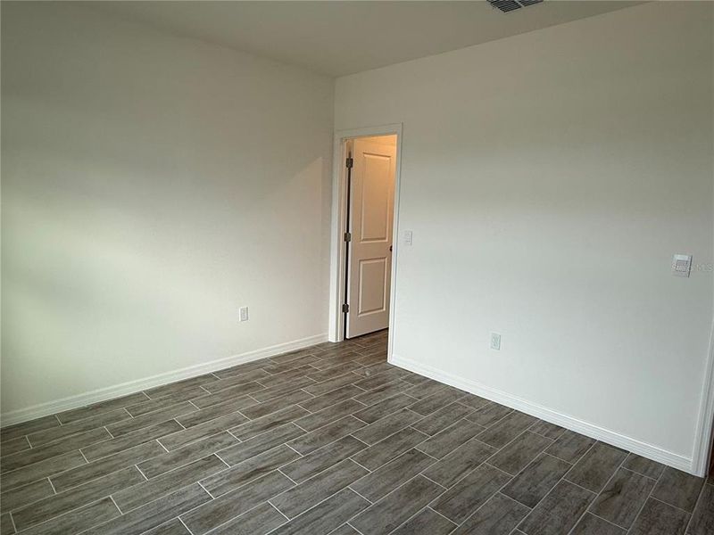 Spacious, unfurnished interior of a new home in Heritage Station, Punta Gorda (Image 21).