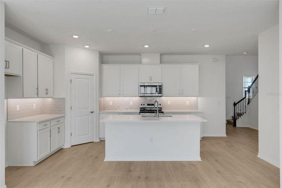 Furnished interior view inside a new home in Seaire, Parrish (Image 11).