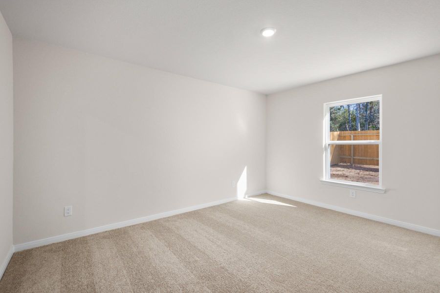 Spacious, unfurnished interior of a new home in Trails at Cochran Ranch, Waller (Image 18).
