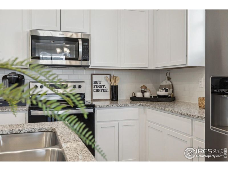 Furnished interior view inside a new home in Settlers Crossing, Commerce City (Image 20).