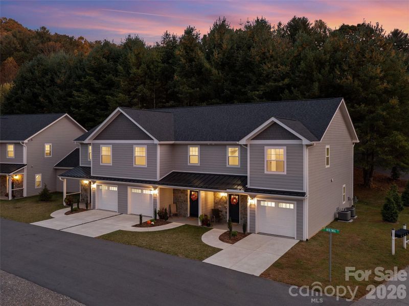 Front exterior of a new home in , Burnsville, NC, highlighting curb appeal (Image 23).