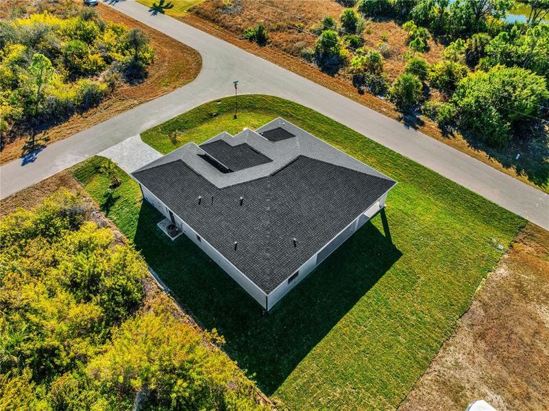 Front exterior of a new home in , Port Charlotte, FL, highlighting curb appeal (Image 27).