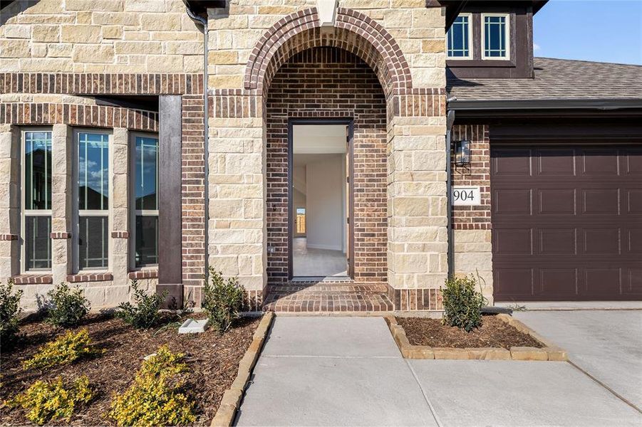 Exterior details and patio area of a home in West Crossing, Anna (Image 3). Exterior details and patio area of a home in West Crossing, Anna (Image 3).