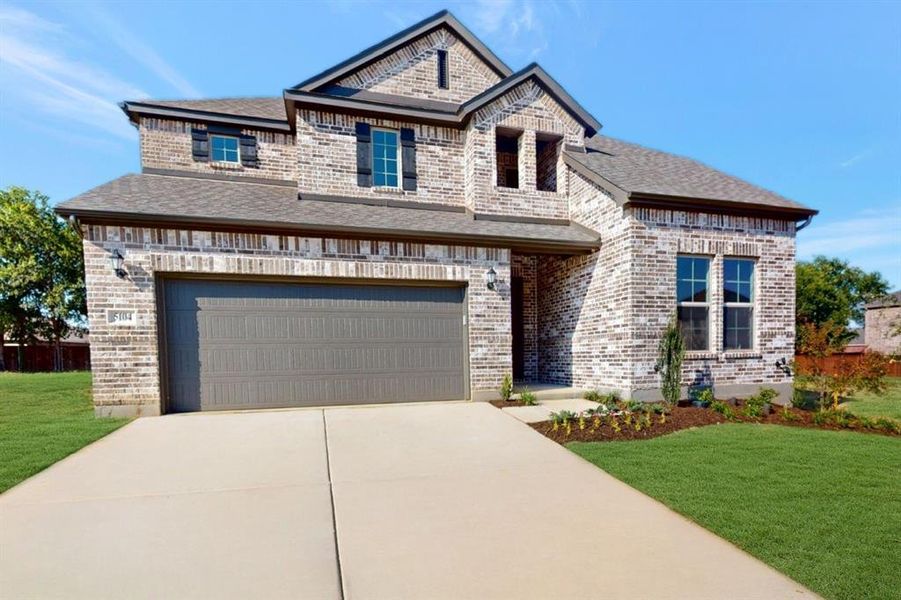 Front exterior of a new home in Vintage Village, Argyle, TX, highlighting curb appeal (Image 1).