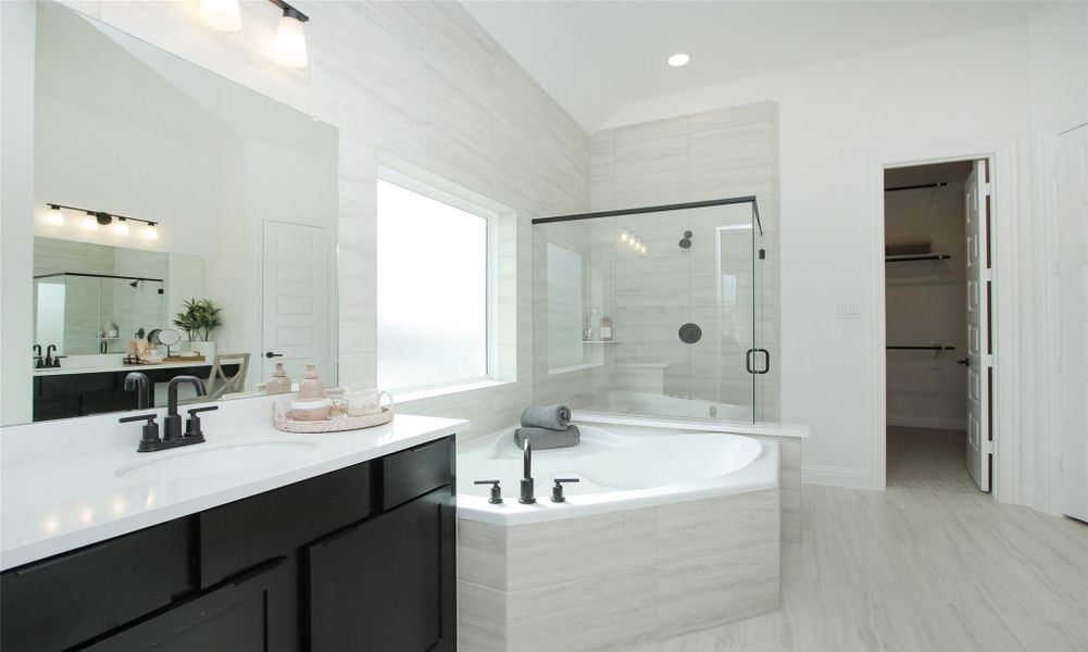 Model home photos of similar floorplans, not pictures of actual home.