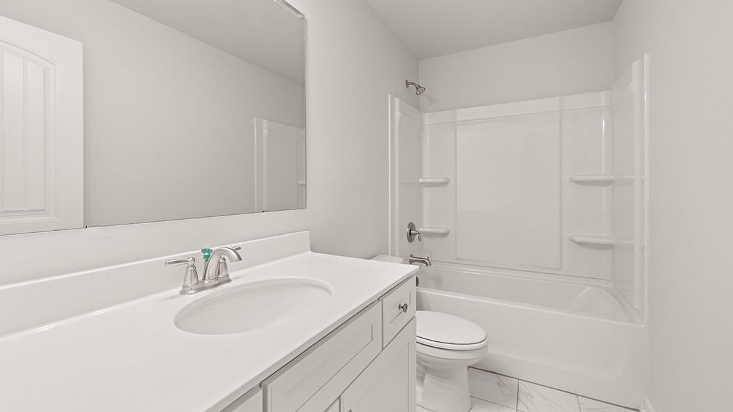 Representative furnished interior of a home built from the WESTERLY by D.R. Horton in Haven Abbey, Cumming (Image 15).