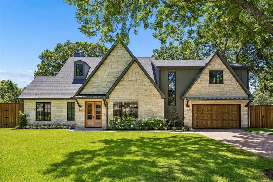 Front exterior of a new home in , Dallas, TX, highlighting curb appeal (Image 1). Front exterior of a new home in , Dallas, TX, highlighting curb appeal (Image 1).