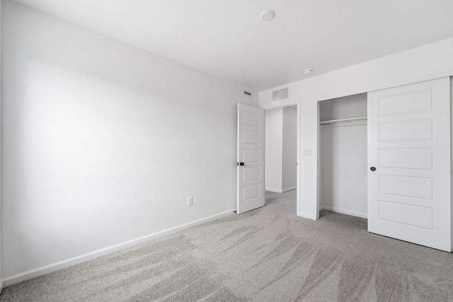 Spacious, unfurnished interior of a new home in Trailstone Townhomes - The Westerly Collection, Arvada (Image 18).