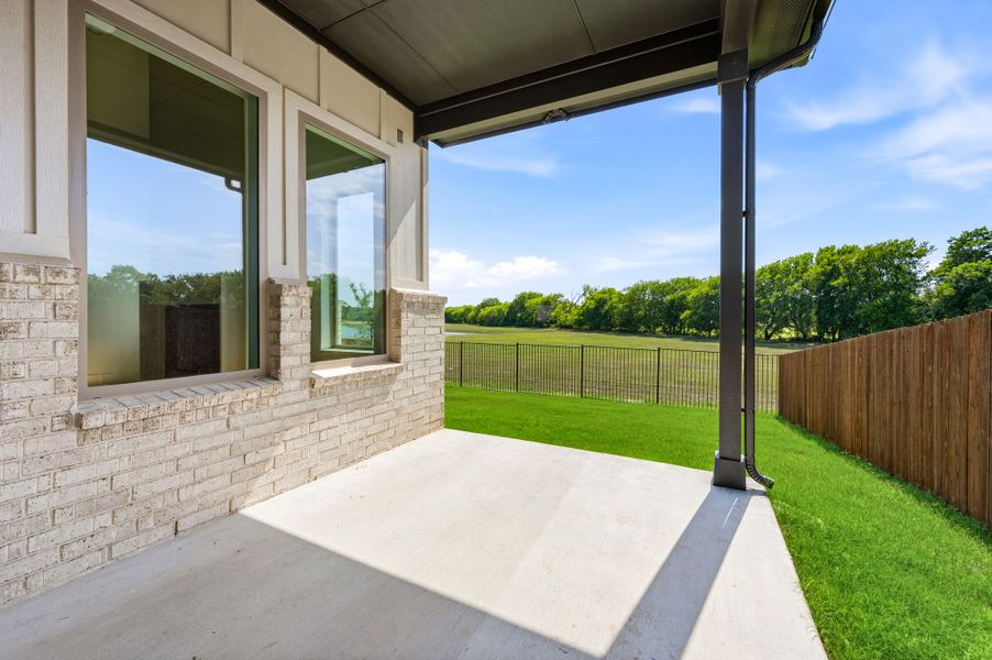 Exterior details and patio area of a home in Parks of Aledo, Aledo (Image 4).